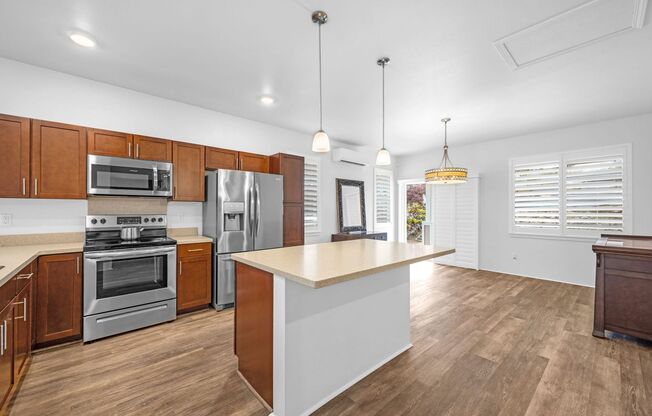 Flexible 6-Month Lease--Solar-Powered Wailuku Home with Ocean views, Fruit Trees, Split AC & Dog-Friendly!