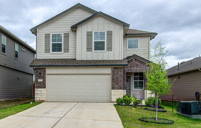 Bastrop four bedrooms, three bathrooms, two living areas, three and a spacious two-car garage!