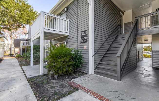 A grey house with a number 3805 on the front.