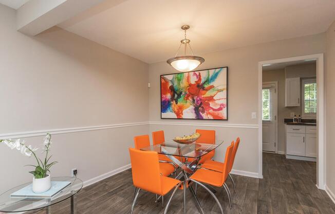 a living room with orange leaves