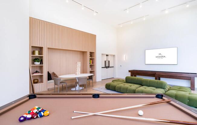 Enjoy game nights and gatherings in Modera Riverside’s stylish game room with billiards and shuffleboard.