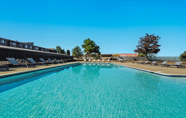 Sparkling Swimming Pool and Sun Deck at Franklin River Apartments in Southfield, MI