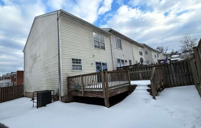 BEAUTIFUL, LARGE 3 BEDROOM RE-MODELED TOWN HOME! END OF GROUP HUGE FENCED IN YARD WITH A DECK! ITS A MUST SEE!