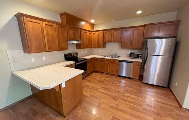 Fantastic Hillsboro Home with Attached Garage, Laundry and Private Patio