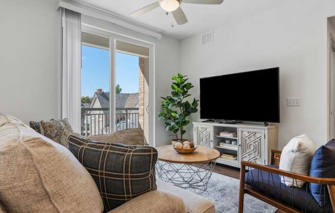 a living room with a couch and a tv