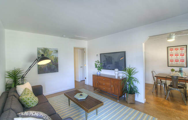 a living room with a couch and a coffee table