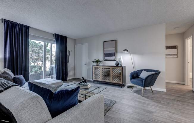 a living room with a couch and a chair