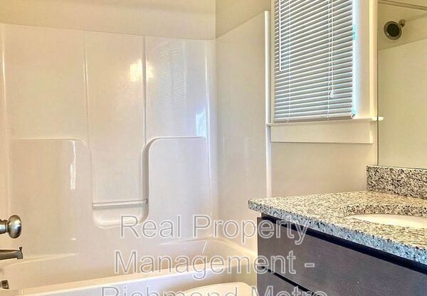 311 W 13 ST 309 W
