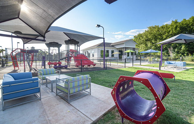 the playground at the flats at big tex apartments