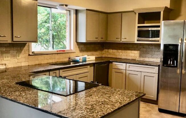 Location! Just updated! open kitchen,slab granite,paint,new appl, no carpet $1750/mo