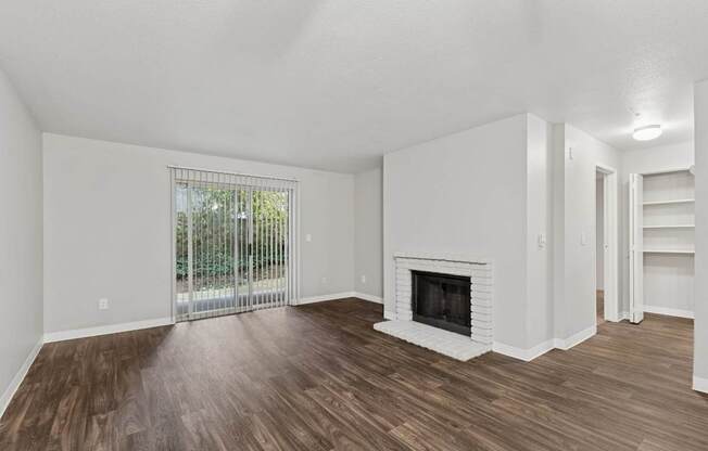 Saratoga Apartments in Everett, Washington Living Room with Fireplace