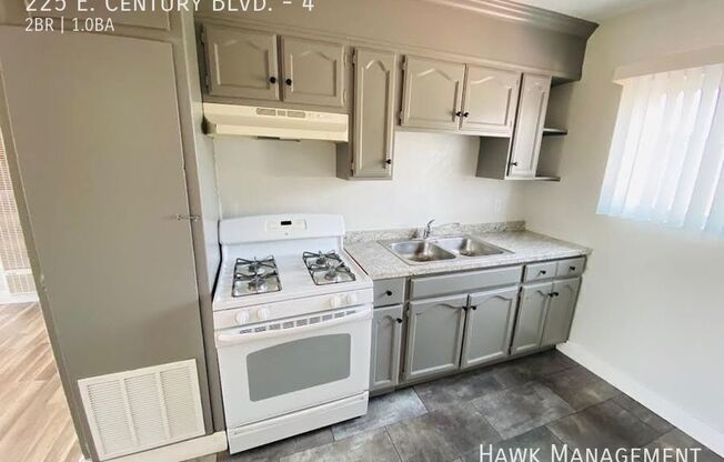225 E CENTURY BLVD