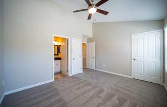 a living room with carpet and a ceiling fan at Traditions at Slate Ridge, Reynoldsburg, 43068