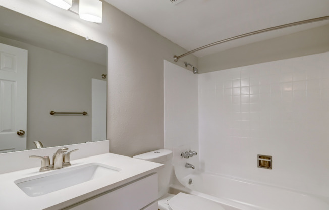 Modern bathrooms with new cabinetry and fixtures