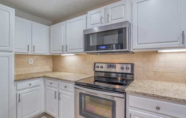 Kitchen with white cabinets  at Windsor at Midtown, Atlanta, GA