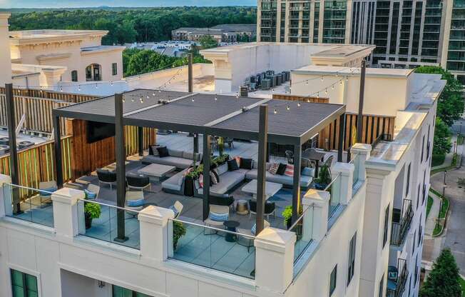 a rooftop bar with a retractable roof