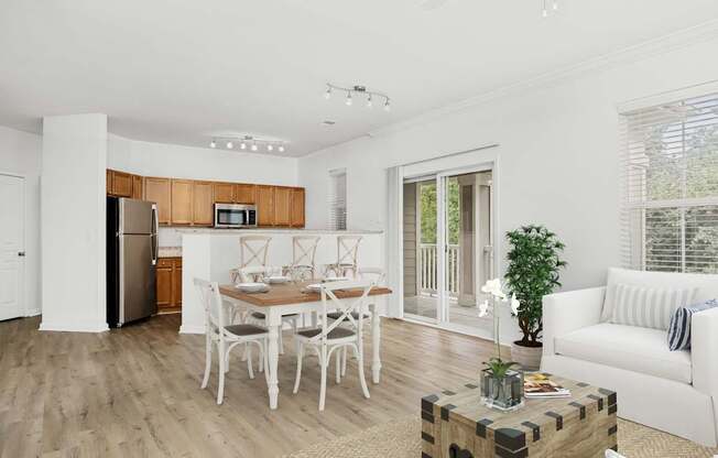 A modern kitchen with a dining table set for six.