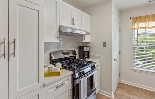 Orchards Apartments Marlborough ma apartment loft style apartments photo of kitchen stainless steel appliances with gas range stove and range hood with white cabinets and wood floors