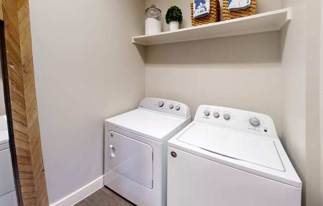the laundry room has a washer and dryer