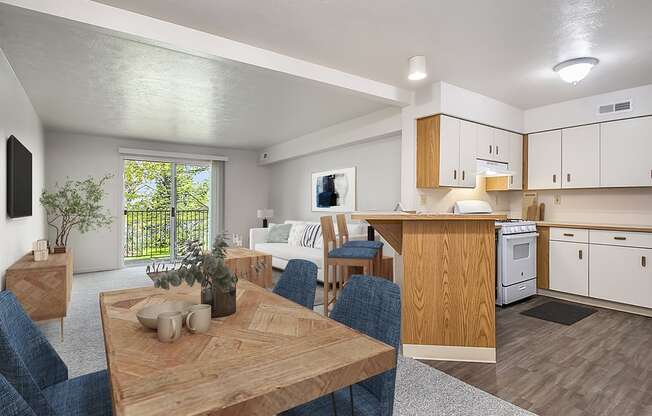 A modern kitchen with a dining table and chairs at The Highlands Apartments, Indiana