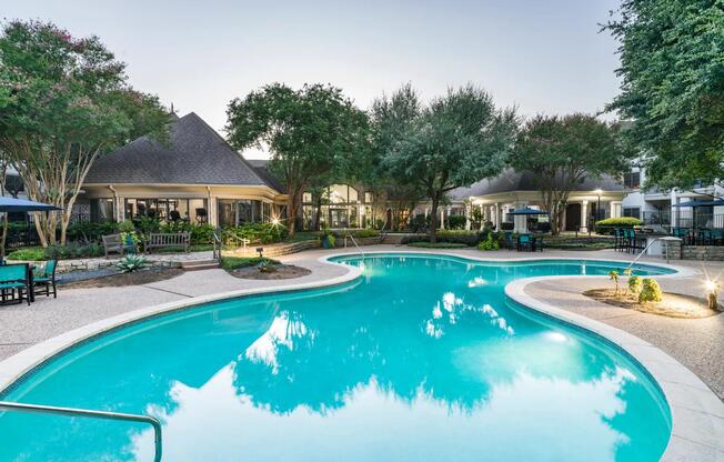 Relax or recharge by the sparkling pool, complete with shaded lounge areas and surrounded by the community’s natural greenery.