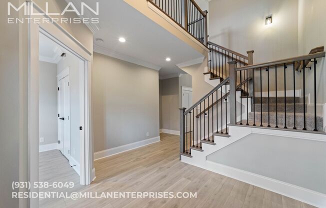 Luxury Living at Its Finest In Sango Featuring An Open Floor Plan, Fireplace and Resort Style Primary Bathroom