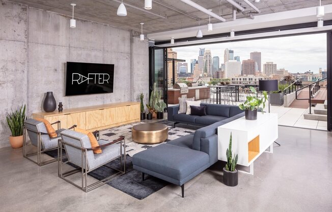 Clubroom seating with view of Minneapolis skyline