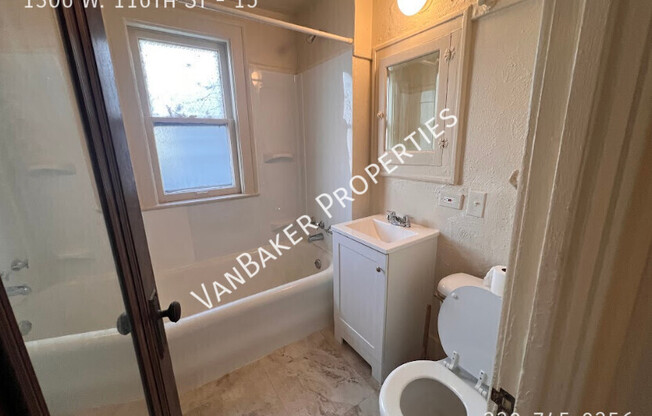 1306 W 116 ST