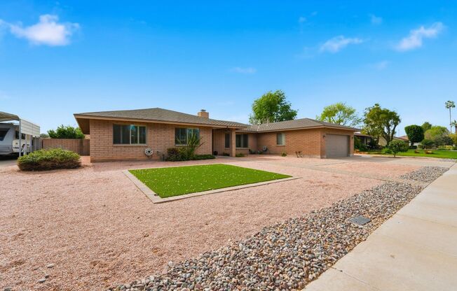 Welcome to this beautiful 4-bedroom, 3-bathroom home in Tempe Arizona!