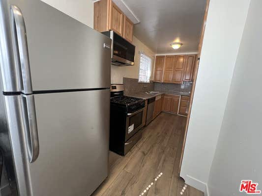 4956 SAN VICENTE BLVD