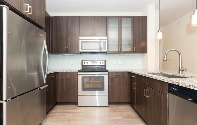 a modern kitchen with stainless steel appliances