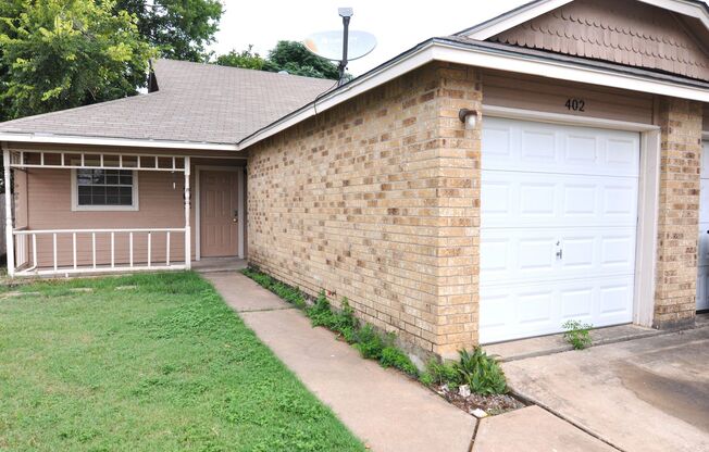 Cute corner lot duplex.
