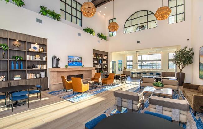 a living room filled with furniture and a large window