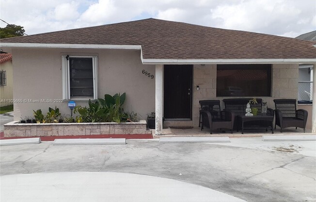 6859 SW 21 ST