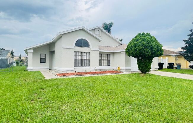 Beautiful 4 Bed / 2 Bath Single-Family Home with Fenced Yard & Screened Patio