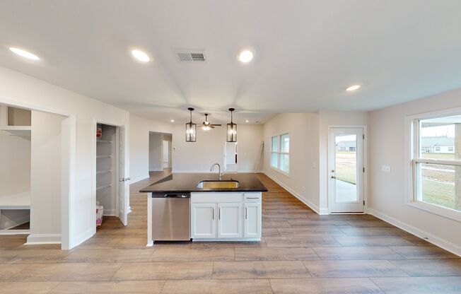 Open-Concept Home with Modern Upgrades Featuring Hardwood Flooring and Open Kitchen