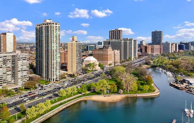A cityscape with a river running through it.