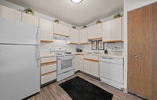 Spacious kitchen with white appliances at Park Lane Apartments in Southfield