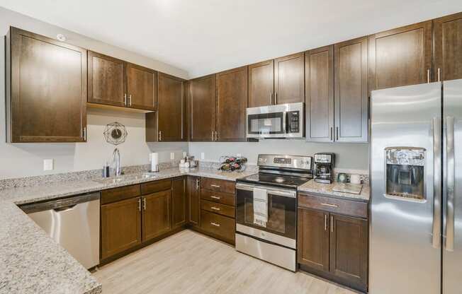 Spacious kitchens with granite countertops at WH Flats new luxury apartments in south Lincoln NE 68516