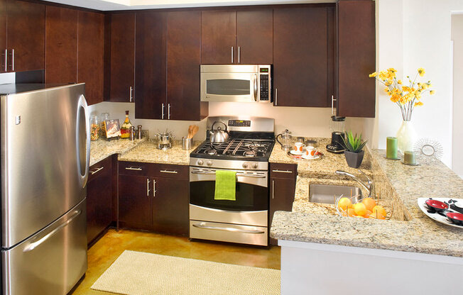 Fitted Kitchen With Island Dining at Highland Park at Columbia Heights Metro, Washington, Washington