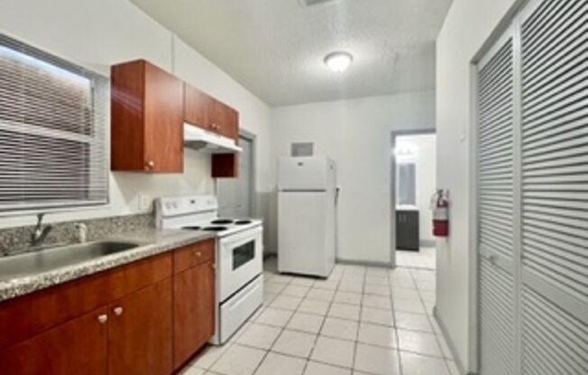 Three Bedroom Single Family Home with Private Fenced Yard