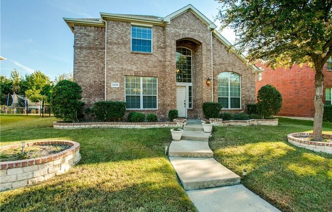 Beautifully landscaped 4 Bedroom 3 bath home located in desirable Plano location!