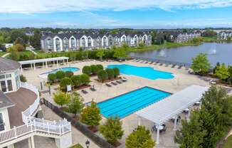 an aerial view of the resort style pool and hot tub