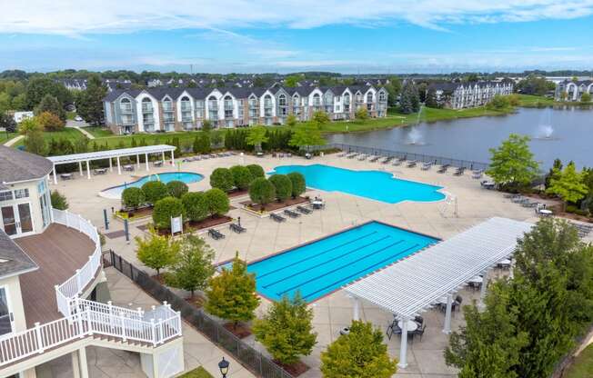 an aerial view of the resort style pool and hot tub