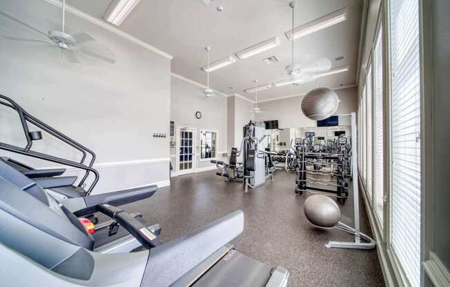 a large fitness room with treadmills and other exercise equipment at Meridian Obici, Suffolk Virginia