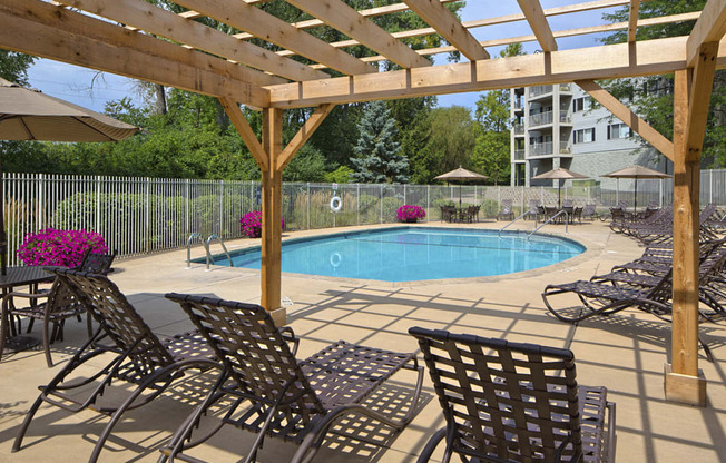 Outdoor pool with lounge chairs and sun terrace