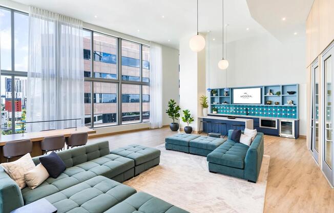 Floor-to-ceiling windows and vibrant design make Modera Riverside’s lounge and coworking space the perfect place to gather in Miami.