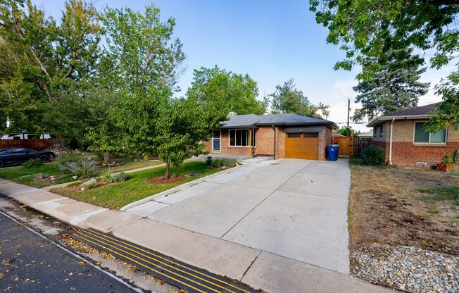 Spacious 4-Bedroom Home with Updated Kitchen, Finished Lower Level & Huge Backyard