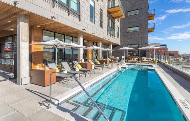 Swimming pool with sundeck, chaise lounges, gorgeous views.