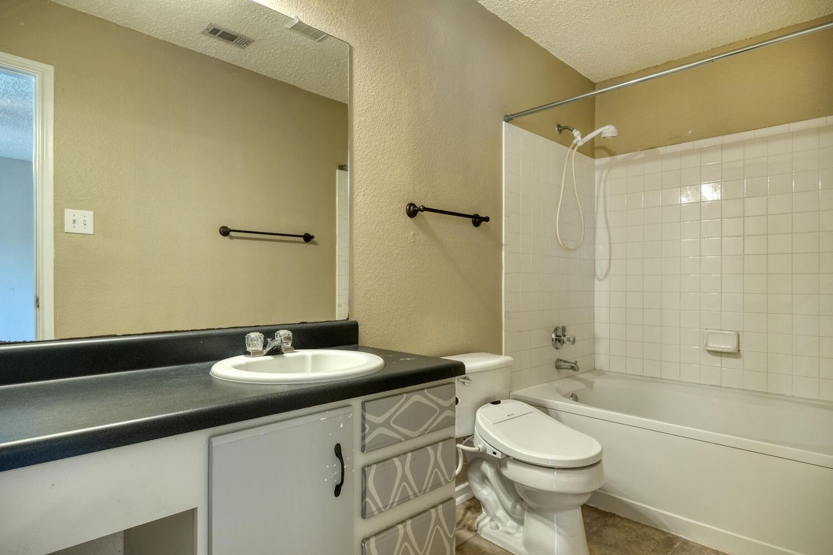 Cute 3/2/2 on corner lot, across the street from Meadow Lake!